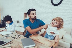 Father is Doing a Homework with Son royalty free stock images Father is Doing a Homework with Son royalty free stock images