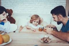 Father is Feeding His Sons a Breakfast stock photography Father is Feeding His Sons a Breakfast stock photography