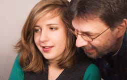 Father helping his daughter with homework stock photos Father helping his daughter with homework stock photos