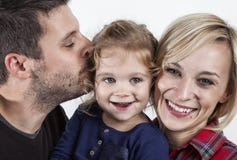 Father kissing his little daughter stock photography Father kissing his little daughter stock photography