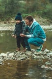 Father and son walk and play together. The autumn in the mountains stock images Father and son walk and play together. The autumn in the mountains stock images