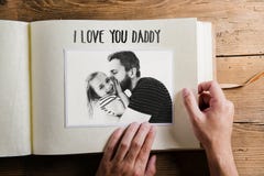 Fathers day concept. Photo album. Wooden background. royalty free stock photos Fathers day concept. Photo album. Wooden background. royalty free stock photos