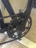 Feche acima de uma roda dentada da bicicleta foto de stock Feche acima de uma roda dentada da bicicleta foto de stock