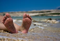 Feet In Sand Royalty Free Stock Photo