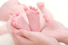 Feet Of Newborn Baby Stock Photo