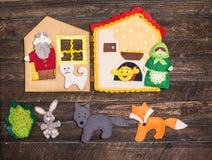 Felt toys story fairy tale. Handmade felt toys over wooden rusti Stock Image Felt toys story fairy tale. Handmade felt toys over wooden rusti Stock Image