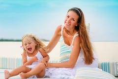 Female And Her Daughter Relax In Sea Backgraund Stock Photography Female And Her Daughter Relax In Sea Backgraund Stock Photography