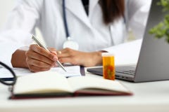 Female black medicine doctor hand hold jar Royalty Free Stock Photo Female black medicine doctor hand hold jar Royalty Free Stock Photo