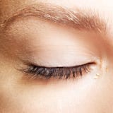 Female closed eyes. Closeup macro beauty portrait of young woman royalty free stock photos Female closed eyes. Closeup macro beauty portrait of young woman royalty free stock photos