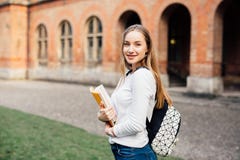Female college student. Happy girl in european university for scholarship. Stock Photography Female college student. Happy girl in european university for scholarship. Stock Photography