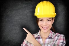 Female construction worker or engineer showing royalty free stock photo Female construction worker or engineer showing royalty free stock photo