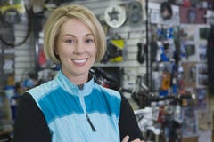 Female Cyclist In Shop Royalty Free Stock Images Female Cyclist In Shop Royalty Free Stock Images