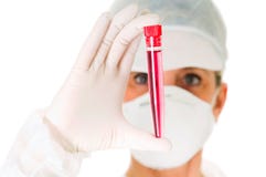 Female Doctor With Mask Holding A Test Tube Stock Image