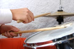 Female Drummer In Action Stock Photo