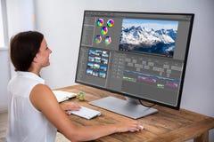 Editor Editing Video On Computer stock image Editor Editing Video On Computer stock image