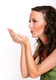Female Expressing Kindness By Blowing Kisses Royalty Free Stock Photography