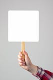 Female hand holding blank mockup banner sign as copy space Royalty Free Stock Photography Female hand holding blank mockup banner sign as copy space Royalty Free Stock Photography