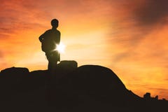 Female hiker enjoying sunset view on a hill royalty free stock image Female hiker enjoying sunset view on a hill royalty free stock image