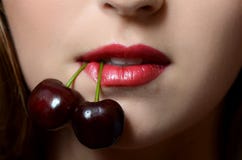 Female Lips Closeup With Sweet Cherry Stock Photography Female Lips Closeup With Sweet Cherry Stock Photography