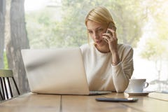 Female person busy working in modern office interior or coffee shop royalty free stock photos Female person busy working in modern office interior or coffee shop royalty free stock photos