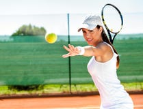 Female playing tennis