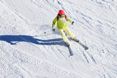 Female skier hitting the slopes at sunny day stock images Female skier hitting the slopes at sunny day stock images