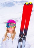 Femme folâtre avec le ski image stock Femme folâtre avec le ski image stock