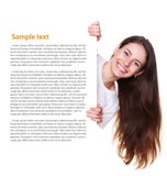 Femme regardant hors du panneau photographie stock Femme regardant hors du panneau photographie stock