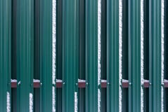 The fence is made of metal plates. royalty free stock image The fence is made of metal plates. royalty free stock image