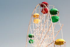 Ferris or devil wheel against blue sky background stock photos Ferris or devil wheel against blue sky background stock photos