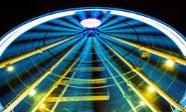 Ferris wheel in motion during night