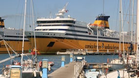 Ferry boat anchored in the port of Livorno. In the foreground nu royalty free stock photos Ferry boat anchored in the port of Livorno. In the foreground nu royalty free stock photos