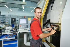 Fertigungsarbeitskraft an der Werkzeugwerkstatt stockfotografie Fertigungsarbeitskraft an der Werkzeugwerkstatt stockfotografie