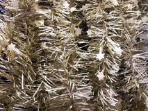 Beautiful Christmas plastic garland sparkling for the New Year, Christmas-tree tinsel, festively decorated. Texture. Background royalty free stock images Beautiful Christmas plastic garland sparkling for the New Year, Christmas-tree tinsel, festively decorated. Texture. Background royalty free stock images