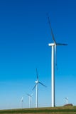 Field with windmills for electric power. Clean energy produced by the wind. Extraction of energy from the air royalty free stock images Field with windmills for electric power. Clean energy produced by the wind. Extraction of energy from the air royalty free stock images