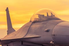 Fighter Jet Military Aircraft Parked On Runway In Sunset Time Stock Photography