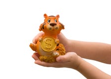 Figure Of A Tiger In Children S Hands. Royalty Free Stock Photos