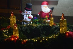 Figures snow white and santa claus and the fourth advent candle in the bistarac royalty free stock photo Figures snow white and santa claus and the fourth advent candle in the bistarac royalty free stock photo