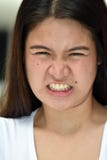 Filipina Female jeune soumis à une contrainte images libres de droits Filipina Female jeune soumis à une contrainte images libres de droits
