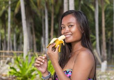 https://thumbs.dreamstime.com/t/filipina-girl-eating-banana-beautiful-eats-nature-67582065.jpg