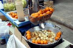 Filipino street food called Kwek Kwek or deep fried quail eggs