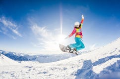 Fille ayant l'amusement sur son surf des neiges image libre de droits Fille ayant l'amusement sur son surf des neiges image libre de droits