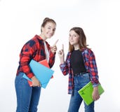 Fille d'adolescents de colledge d'école avec les carnets stationnaires de livres photographie stock libre de droits Fille d'adolescents de colledge d'école avec les carnets stationnaires de livres photographie stock libre de droits