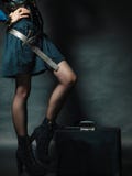 Fille de Steampunk avec le rétro sac images libres de droits Fille de Steampunk avec le rétro sac images libres de droits