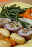 Filled Rolled Lamb With Roast Potatoes Stock Photography