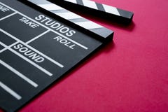 Filmu clapper na czerwonym tle obraz stock Filmu clapper na czerwonym tle obraz stock