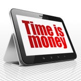 Finance concept: Tablet Computer with Time is Money on display royalty free stock images Finance concept: Tablet Computer with Time is Money on display royalty free stock images