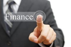 Finances de pressing d'homme d'affaires sur le bouton virtuel photos stock Finances de pressing d'homme d'affaires sur le bouton virtuel photos stock