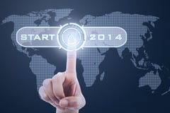 Finger touching button start to 2014 stock images Finger touching button start to 2014 stock images