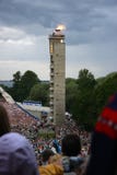 Fire of Estonian national song festival. A photo of a fire of Estonian national song and dance festival just arrived to the tower where it flames during the royalty free stock image Fire of Estonian national song festival. A photo of a fire of Estonian national song and dance festival just arrived to the tower where it flames during the royalty free stock image